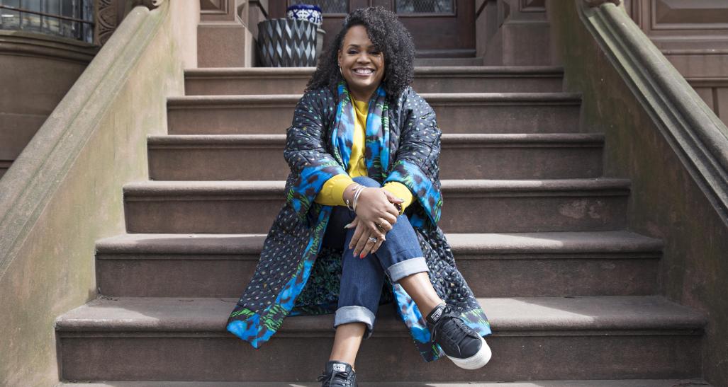Lisa Price sitting on steps