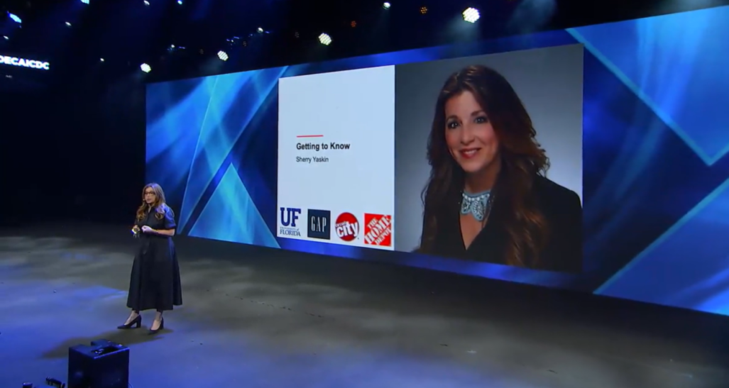 Sherry Yaskin presenting onstage at DECA conference